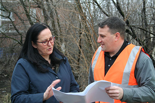 MWRD Commissioner Mariyana Spyropoulos and Maine Township Highway Commissioner Ed Beauvais review plans for Project FRCR-9, which will provide flood relief to residents in unincorporated Maine Township.